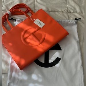 Telfar bag medium Orange...New With Tags...Authentic...Ships Same
Day